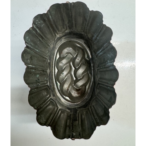 356 - A Victorian copper & steel jelly mould stamped '1 1/2 cm 200'