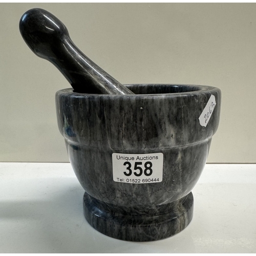 358 - A polished stone pestle & mortar