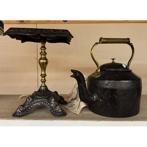 372 - A Victorian brass & iron trivet & a cast iron range kettle