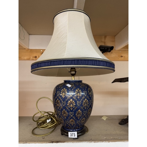 373 - A Decorative ginger jar shaped lamp with shade