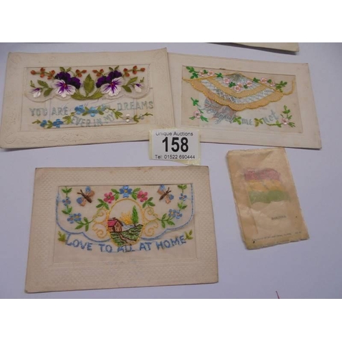 158 - Eight early 20th century silk embroidered greeting cards and two Jerusalem souvenir books.