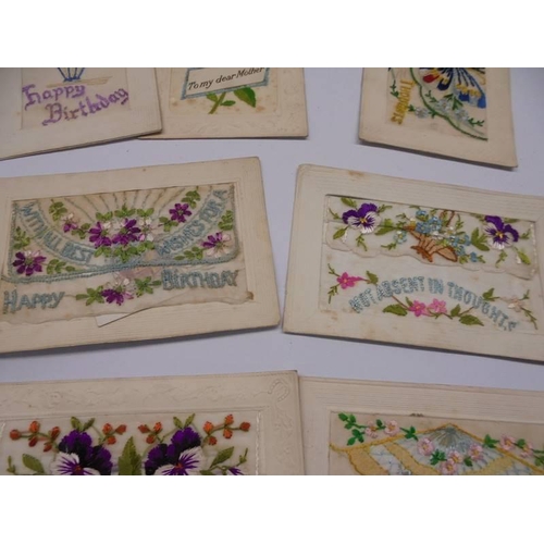 158 - Eight early 20th century silk embroidered greeting cards and two Jerusalem souvenir books.