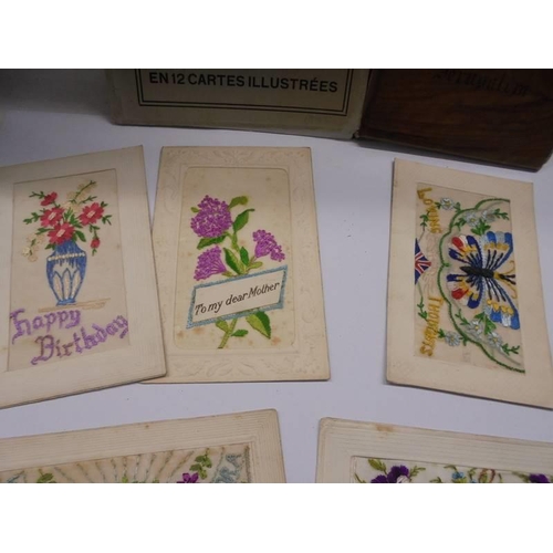 158 - Eight early 20th century silk embroidered greeting cards and two Jerusalem souvenir books.