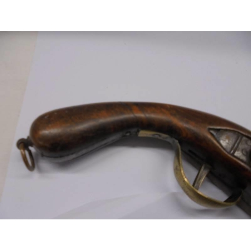 173 - An early 19th century Flintlock pistol with brass and iron fittings.