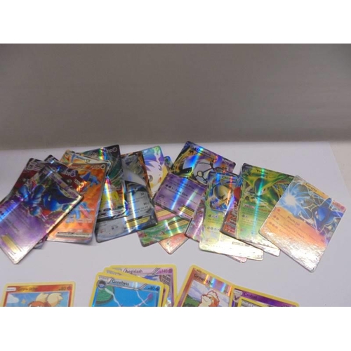 178 - A collection of Pokemon cards including foils.