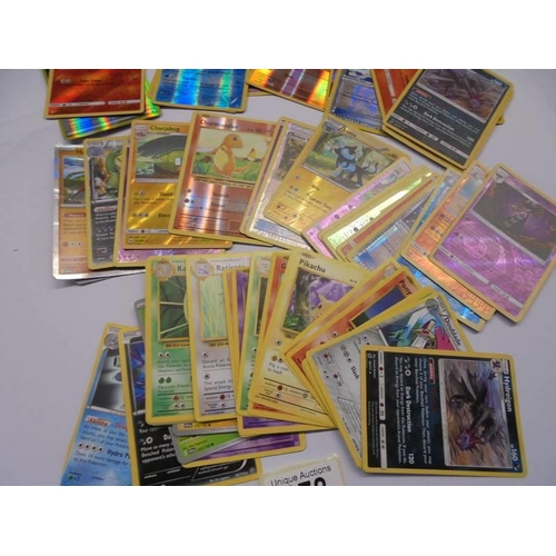 178 - A collection of Pokemon cards including foils.