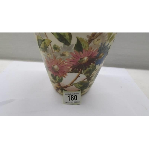 180 - A 19th century glass vase hand painted with birds and flowers.