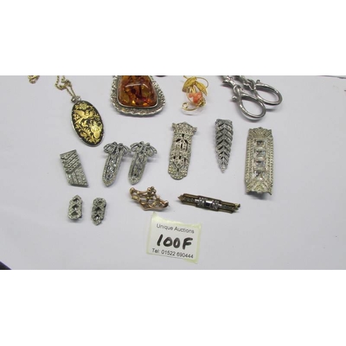 100F - A mixed lot of jewellery including art deco paste, amber pendant, earrings and other items etc.,