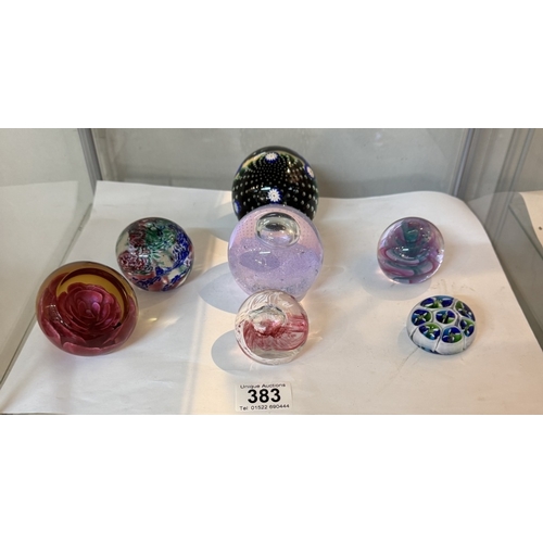 383 - 7 Paperweights including Caithness Ozone, other Caithness, Murano etc