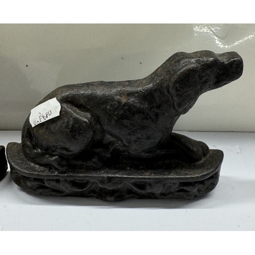 391 - A pair of Victorian metal dogs. Left / right