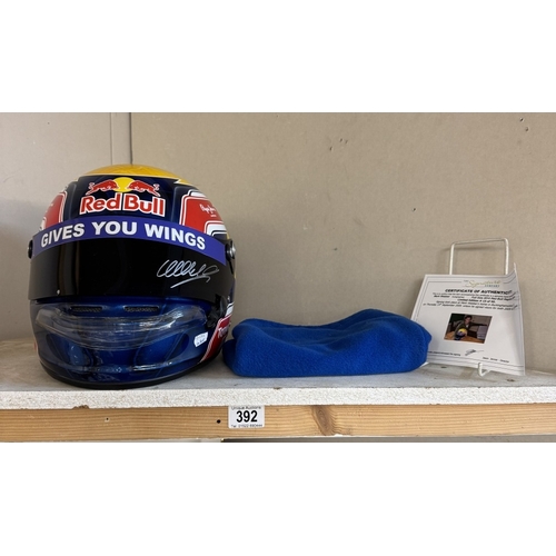 392 - A signed Mark Webber Red Bull racing helmet