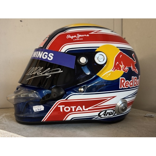 392 - A signed Mark Webber Red Bull racing helmet