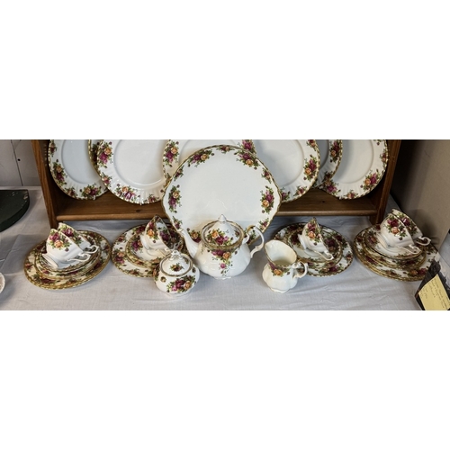 393 - Approximately 48 pieces of Royal Albert Country Roses dinner set. All 1sts