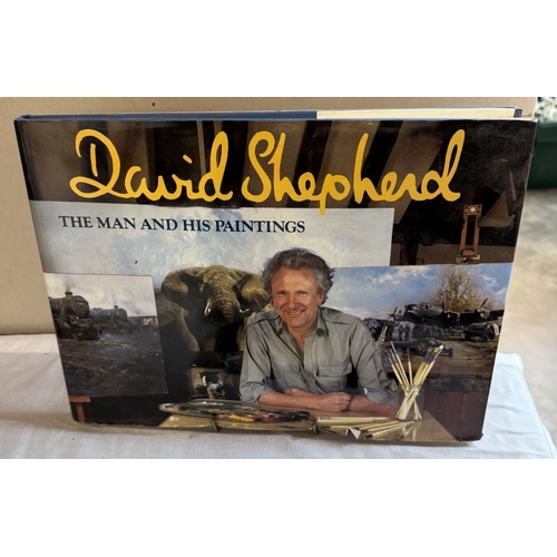 395 - A signed David Shepherd book & signed print of elephants.