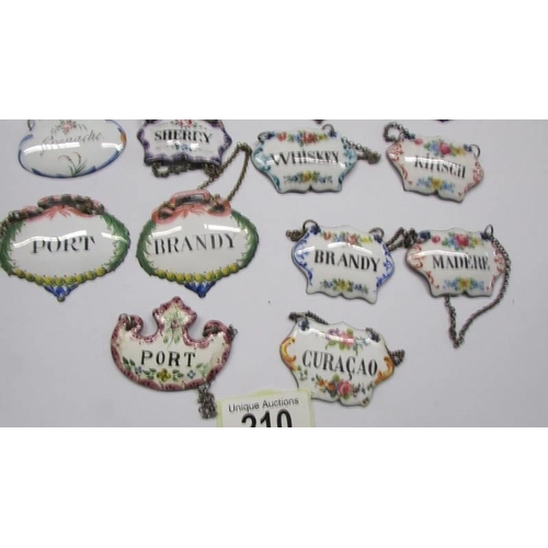 210 - Twenty enamel decanter labels.