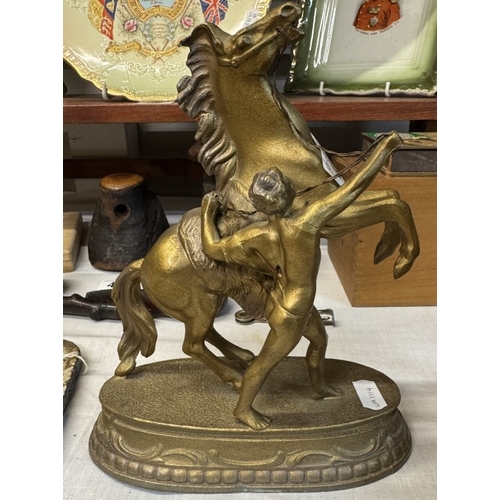 408 - A pair of early 20th century gilded spelter Marley horses