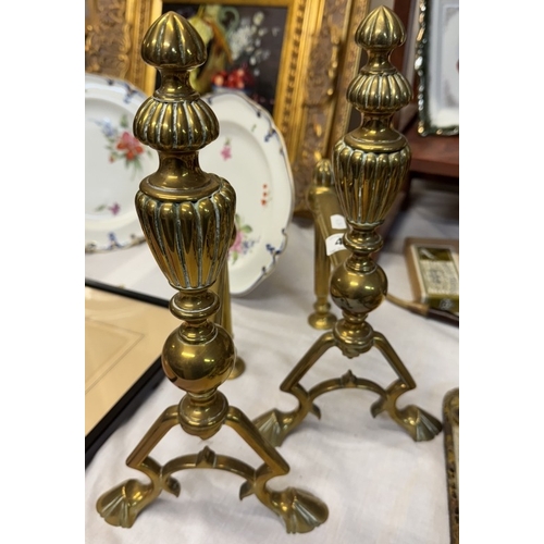 412 - A pair of Victorian brass fire dogs