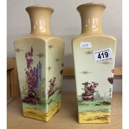 419 - A pair of Kiralpo ware ceramic vases