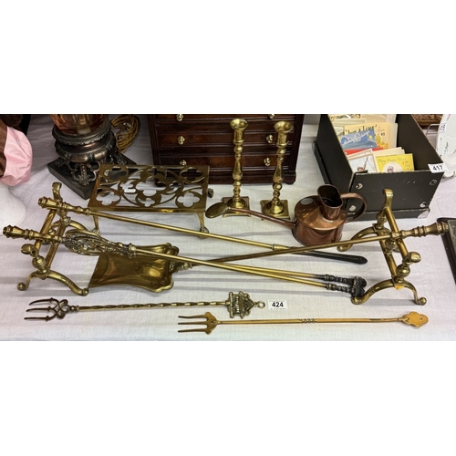 424 - A Victorian brass fire irons & dogs, other brassware & Haws copper watering can