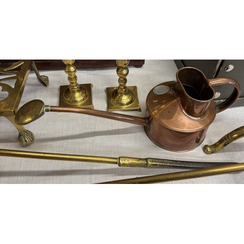 424 - A Victorian brass fire irons & dogs, other brassware & Haws copper watering can