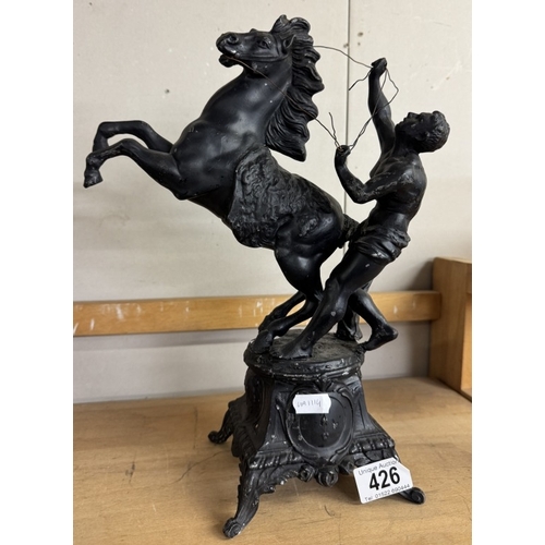 426 - A pair of Spelter figures with rearing horses