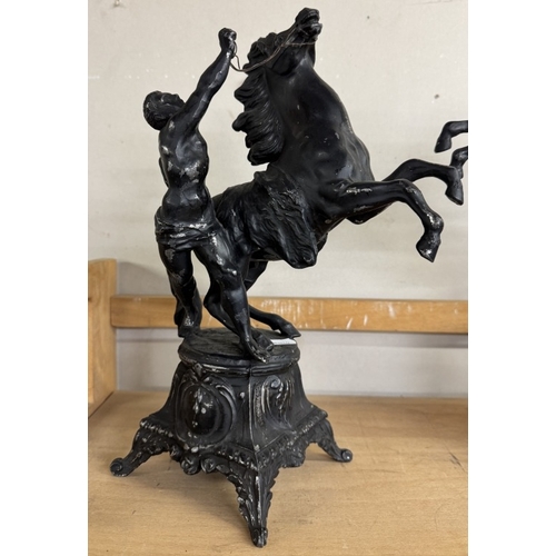 426 - A pair of Spelter figures with rearing horses