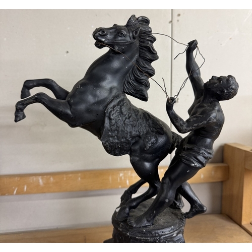 426 - A pair of Spelter figures with rearing horses