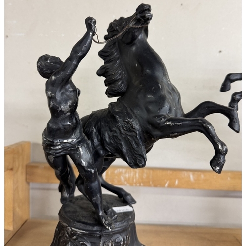 426 - A pair of Spelter figures with rearing horses