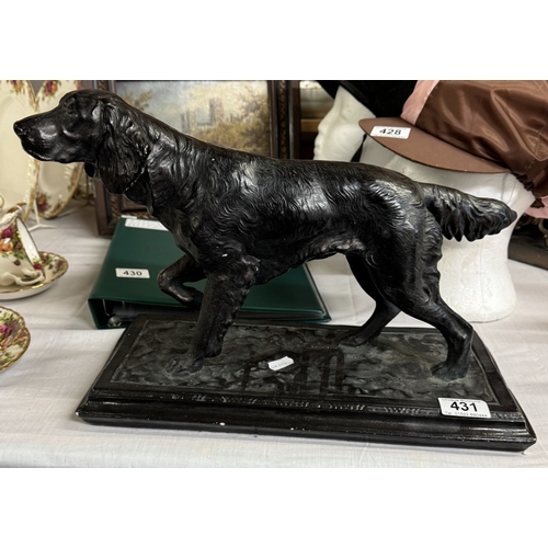 431 - A large plaster figure of a Gun dog with a bronzed finish