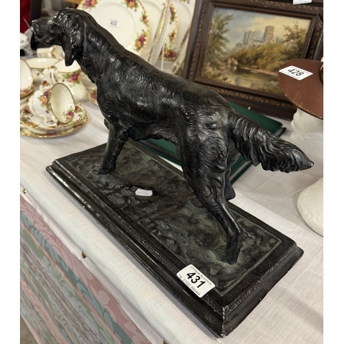 431 - A large plaster figure of a Gun dog with a bronzed finish