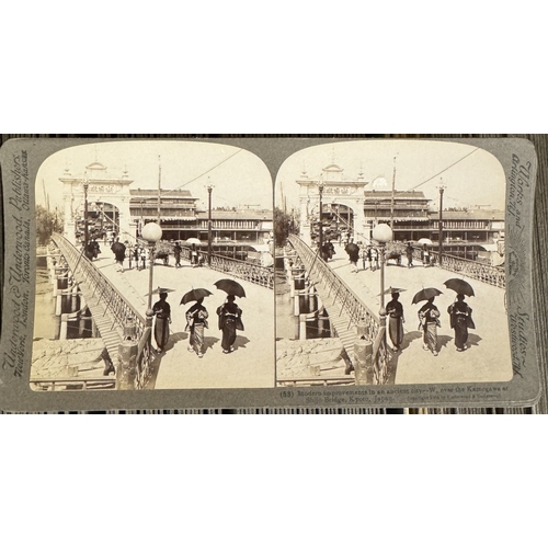 435 - 2 antique stereoscope viewers with a large quantity of cards including Japan through the stereoscope