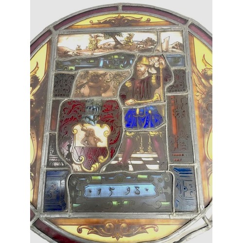 231 - A 16th century stained glass panel of Philip II of Spain, dated 1598, COLLECT ONLY.