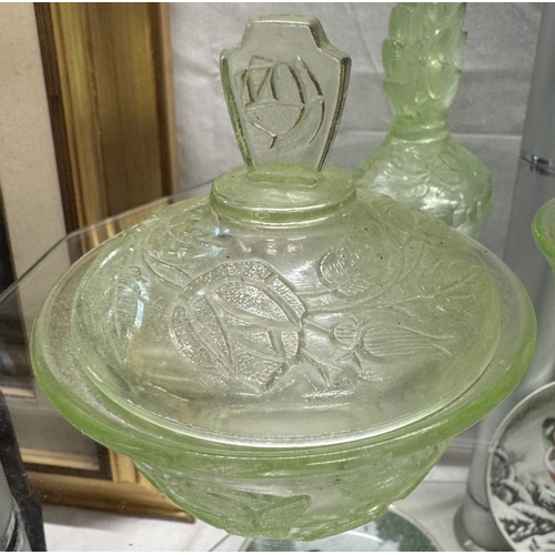 460 - A quantity of vintage green glass including vase, trinket pots & candlesticks