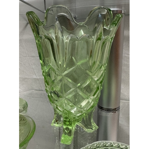 460 - A quantity of vintage green glass including vase, trinket pots & candlesticks