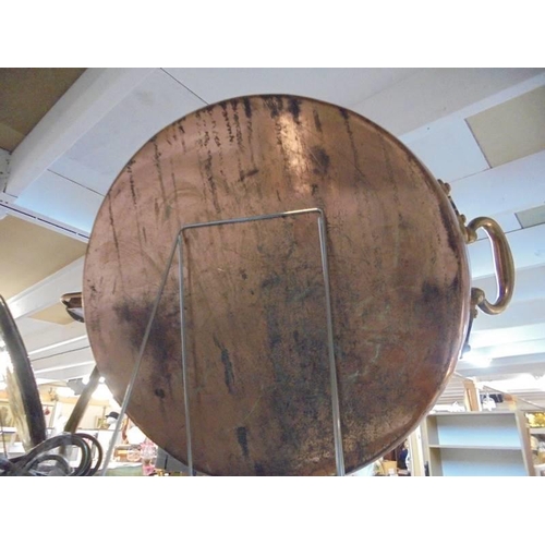 287 - A large copper pan.