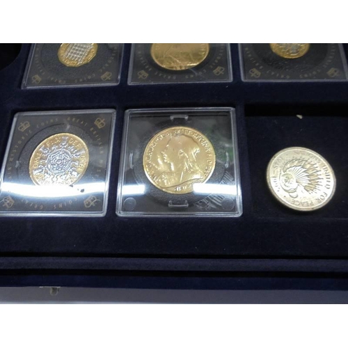 290 - Eleven gold plated commemorative coins with certificates in a case.