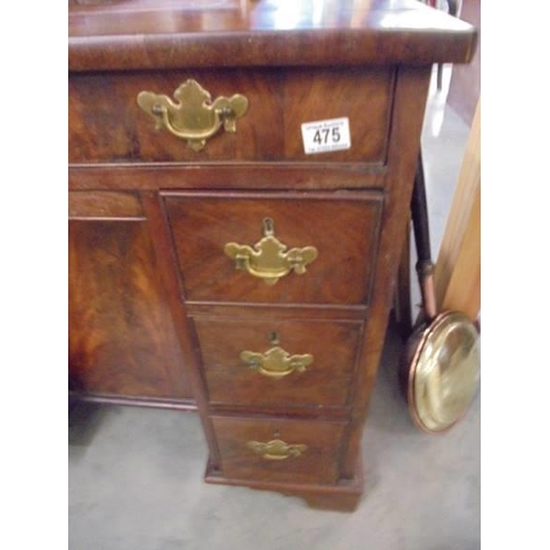 475 - A good quality small mahogany kneehole desk.