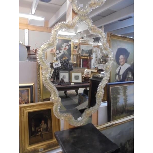 493 - A pair of antique Venetian style wall mirrors .  65 x 49 cm.