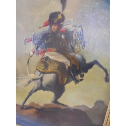 496 - A gilt framed oil on canvas Cavalier on horse back, image 60 x 40 cm, framed 72 x 52 cm.