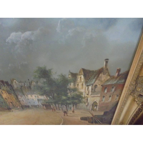 499 - A gilt framed signed oil on canvas town scene, image 90 x 60 cm, frame 105 x 75 cm.