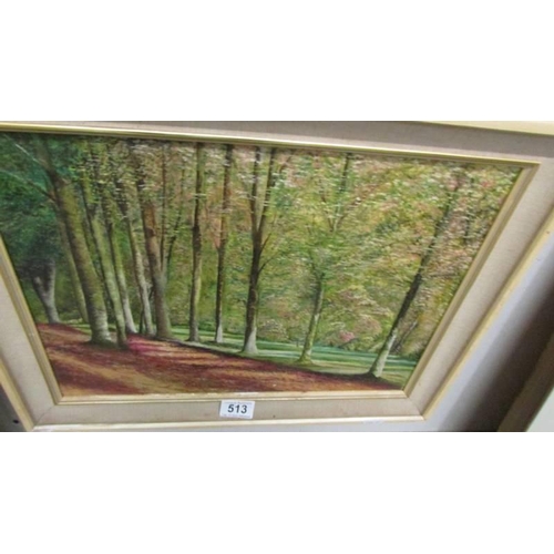 513 - An oil on canvas woodland scene.