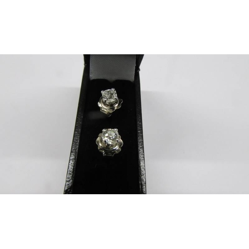 100Q - A pair of old mine cut diamond stud earrings, 6ct total in 18ct gold.