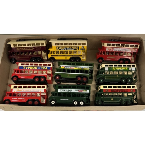 533 - 2 shelves of die cast model buses