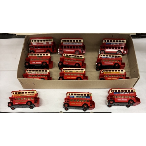 533 - 2 shelves of die cast model buses