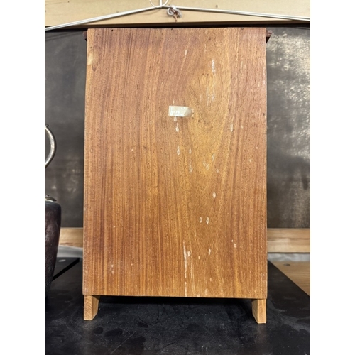 539 - A teak specimen chest of drawers with brass inlay