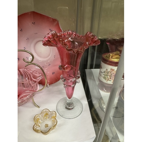 541 - A quantity of cranberry glassware including spill vase, bell & a quantity of other glassware