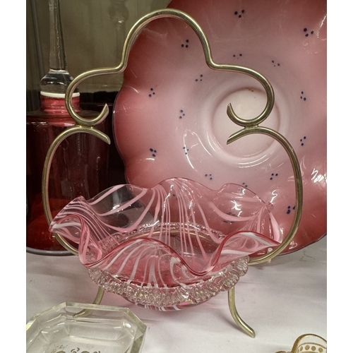 541 - A quantity of cranberry glassware including spill vase, bell & a quantity of other glassware