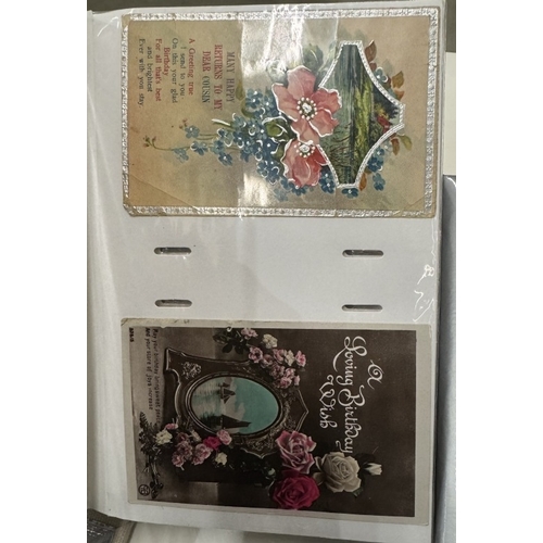 550 - 2 albums of postcards including greeting, flowers & birthday etc. (approximately 400 cards) & 3 albu... 