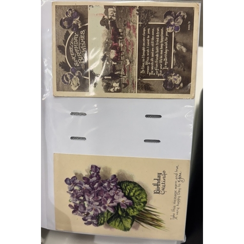 550 - 2 albums of postcards including greeting, flowers & birthday etc. (approximately 400 cards) & 3 albu... 