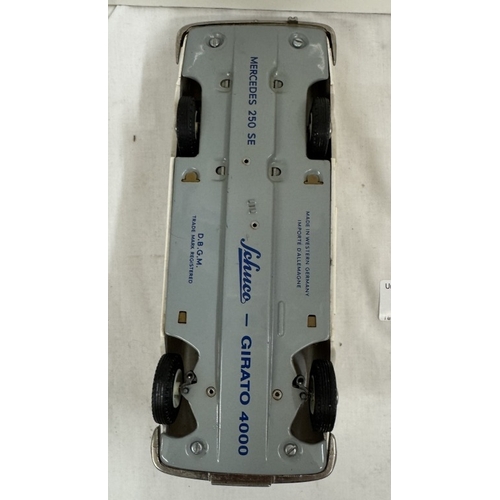 554 - A Schuco Girato 4000 Merecedes 250SE convertible clockwork car